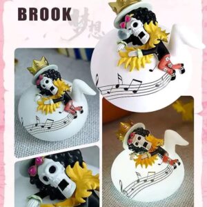 Figurine Brook musicien endormi sur socle LED avec motifs musicaux