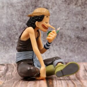 Figurine Usopp en contemplation, tenant une fleur